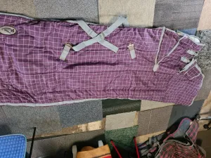 6'9 purple checkered rhinegold heavy stable rug with neck, great condition