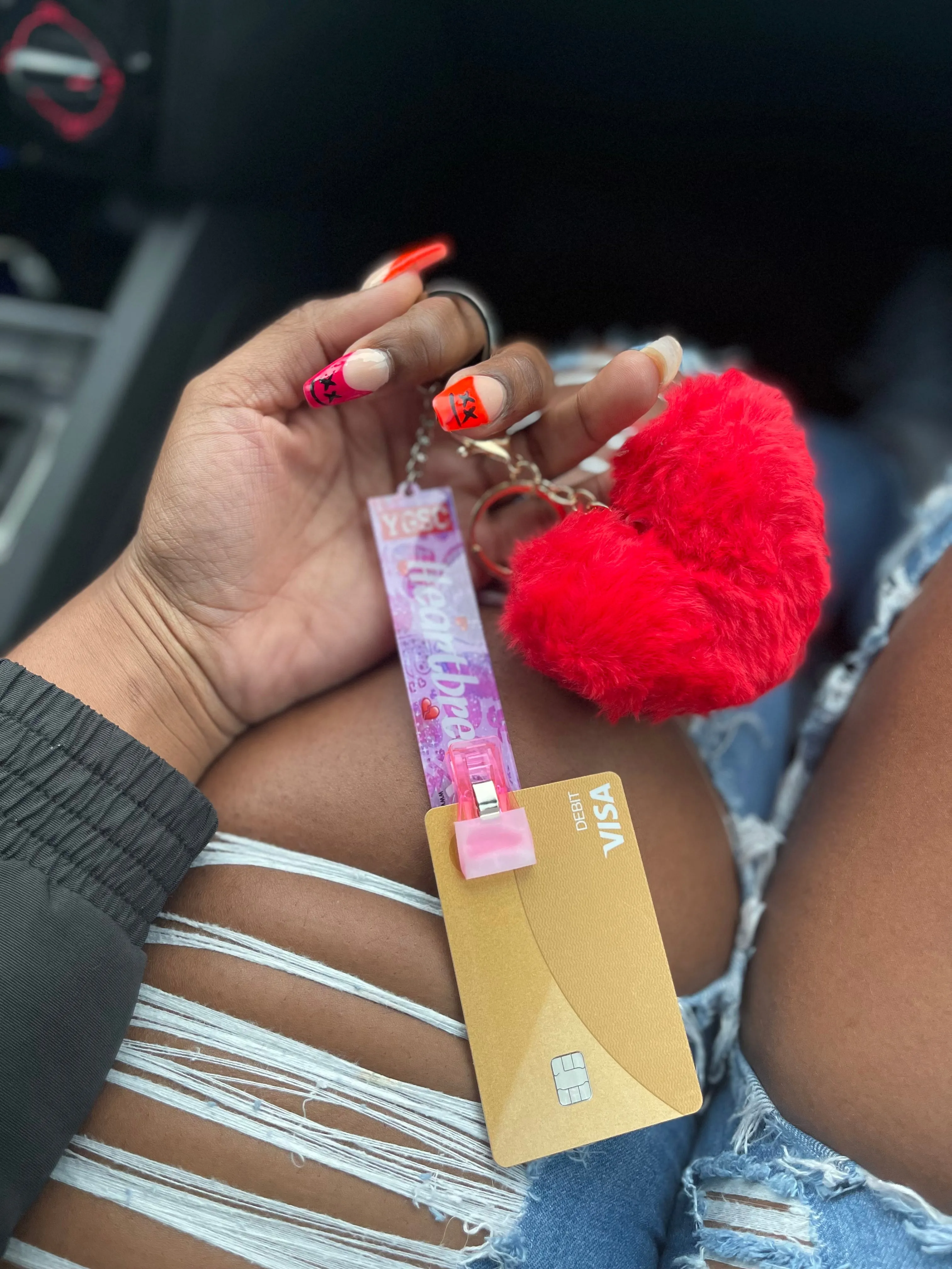 Ladies card grabber for ATM machine with heart puff