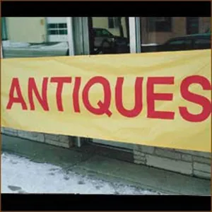 "Antiques" - 3' x 10'Red On Yellow Banner