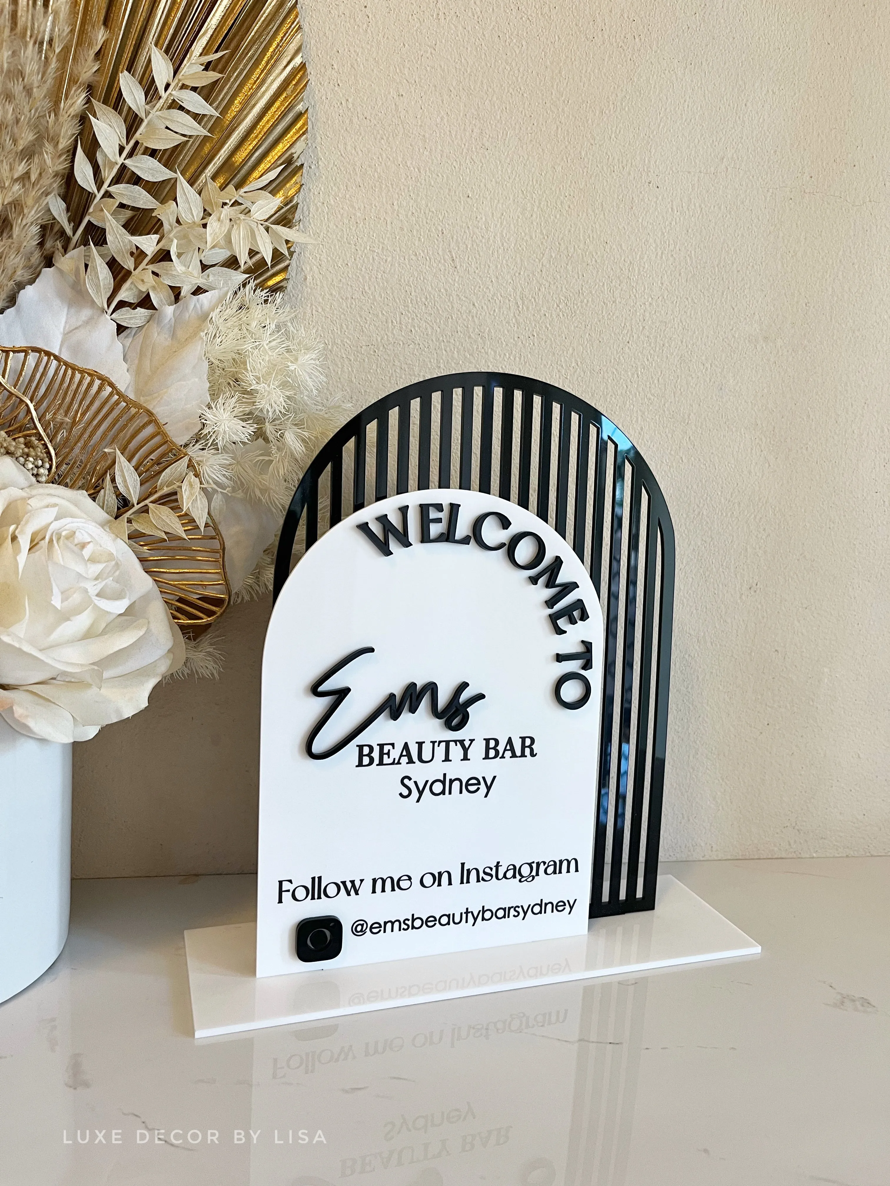 The Double Arched Welcome Logo Sign